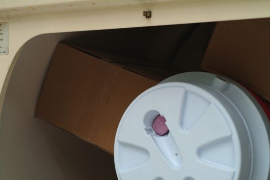 Tumbler barrel inside clothes dryer, detail.