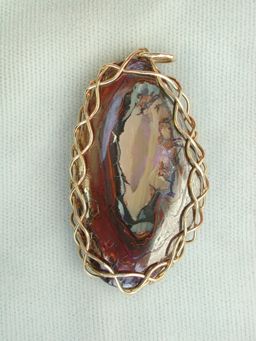 one side of opal pendant