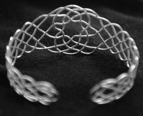 Composite -- Turk's-head and Prolong bracelet back view.