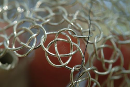 opened solder joints in knotted chain mail